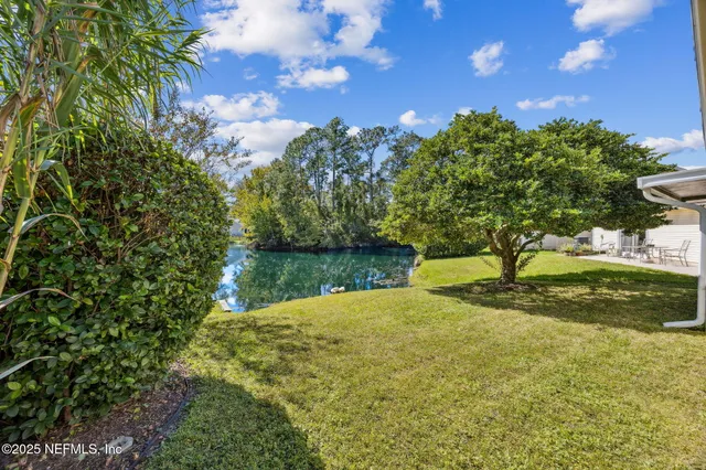 a view of a lake from a yard