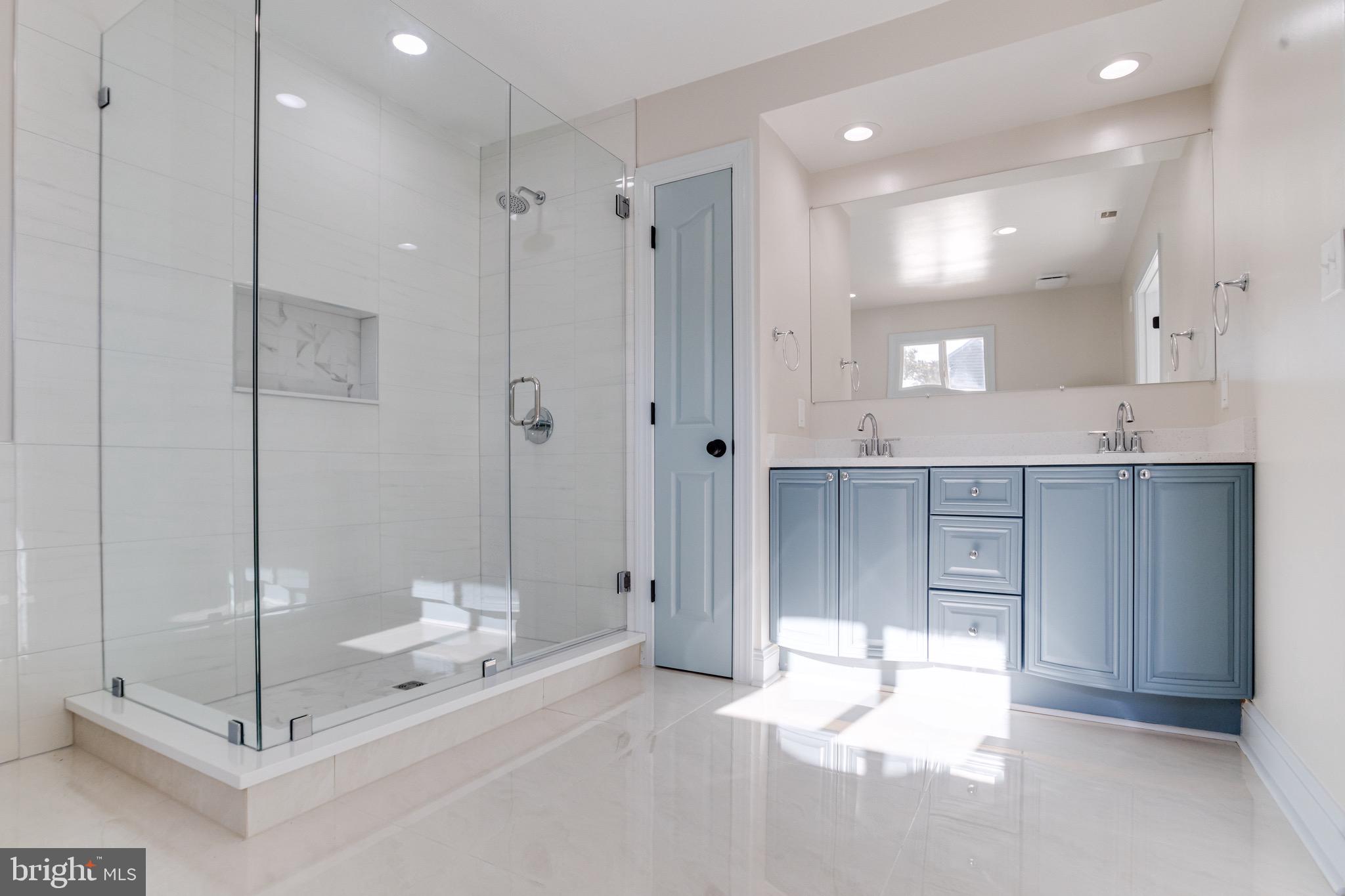 5717 Station Road White Marsh, MD 21162 - Photo 34 of 62 a bathroom with a shower and a sink