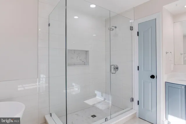 a bathroom with a sink a toilet and a bathtub