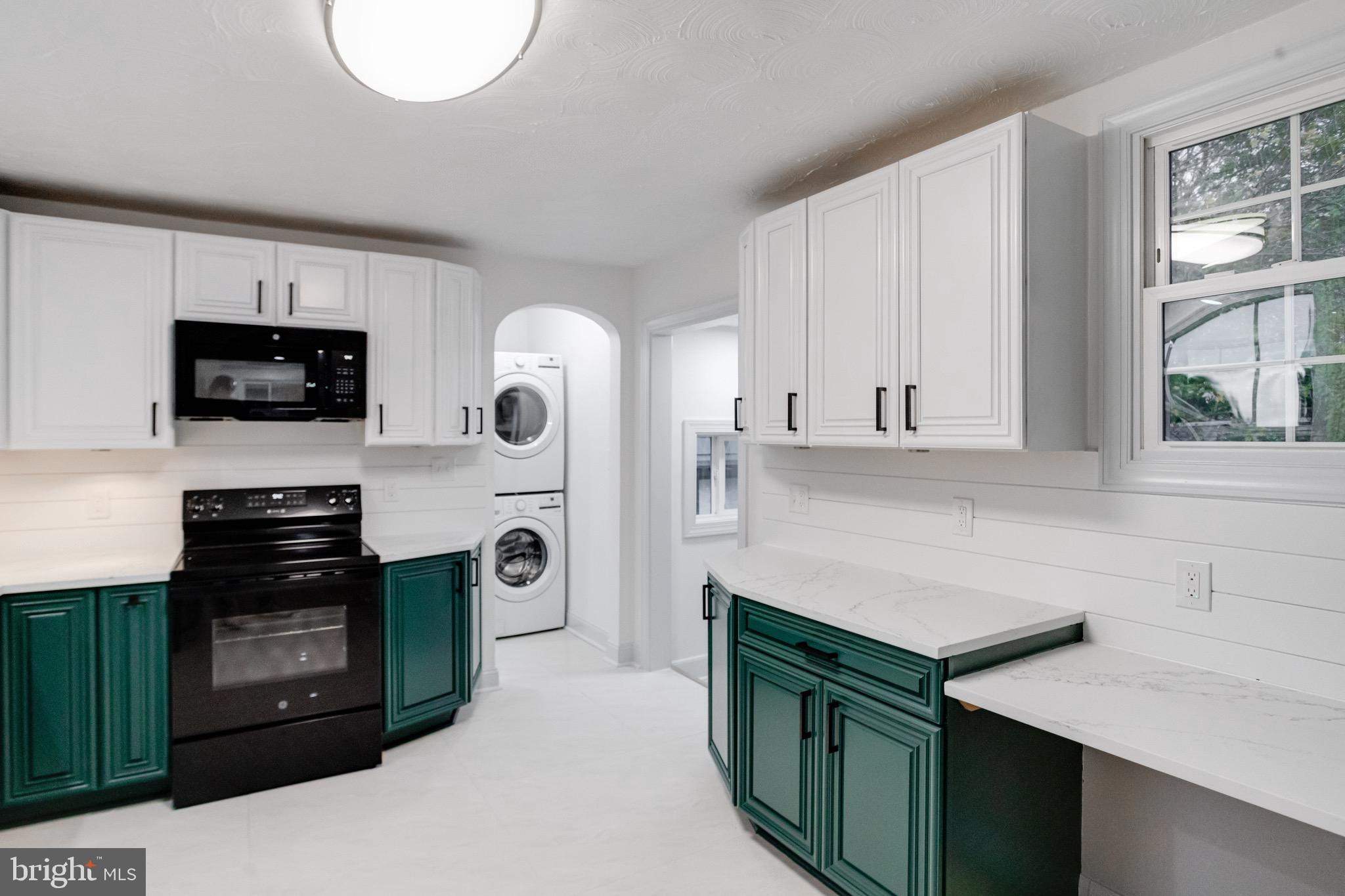 5717 Station Road White Marsh, MD 21162 - Photo 6 of 62 a kitchen with stainless steel appliances granite countertop a refrigerator and a stove