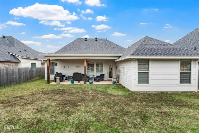a front view of house with outdoor seating