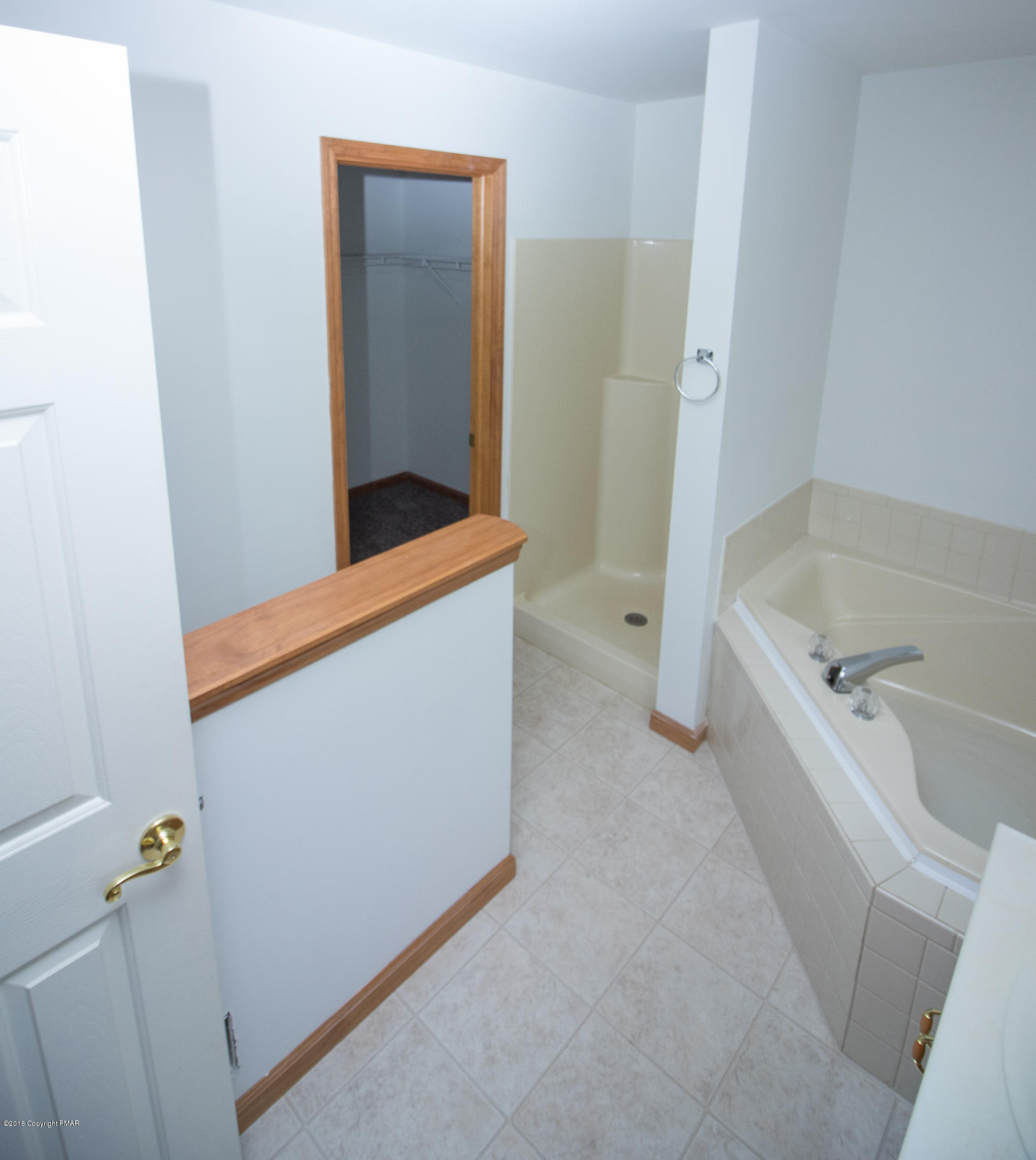 186 Granite Road Long Pond, PA 18334 - Photo 12 of 12 a bathroom with a tub sink and mirror
