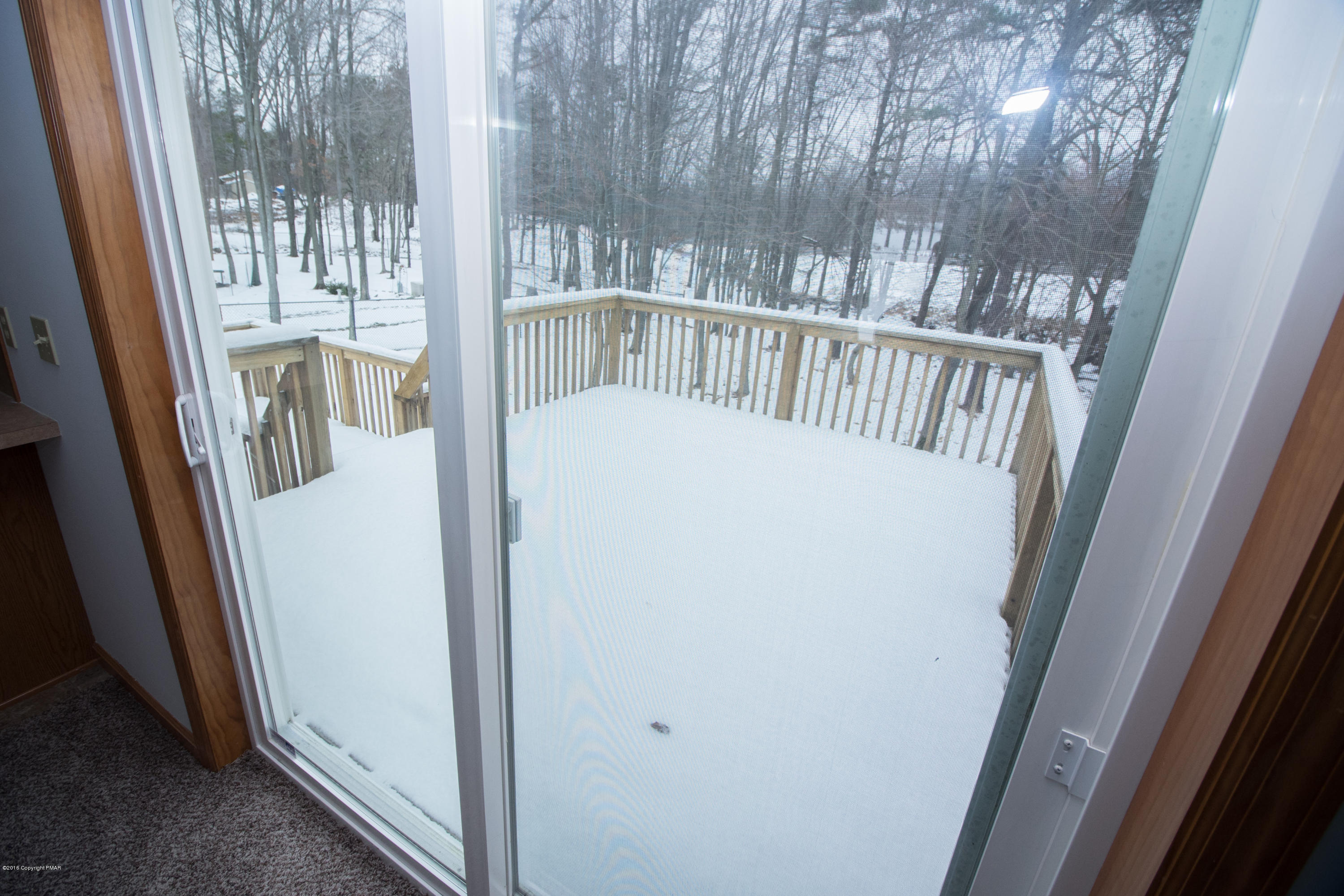 186 Granite Road Long Pond, PA 18334 - Photo 5 of 12 a view of balcony with wooden floor
