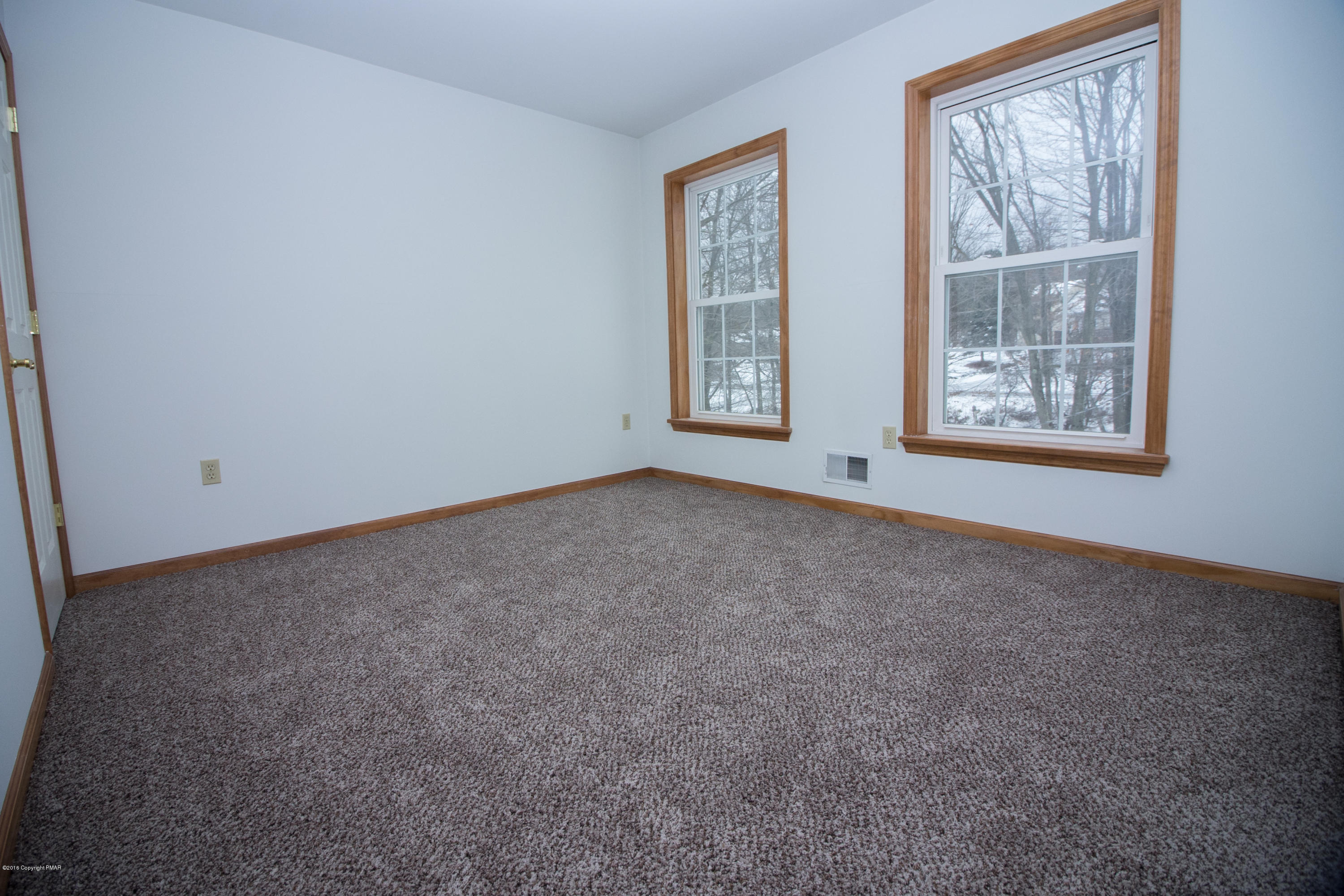 186 Granite Road Long Pond, PA 18334 - Photo 8 of 12 an empty room with windows