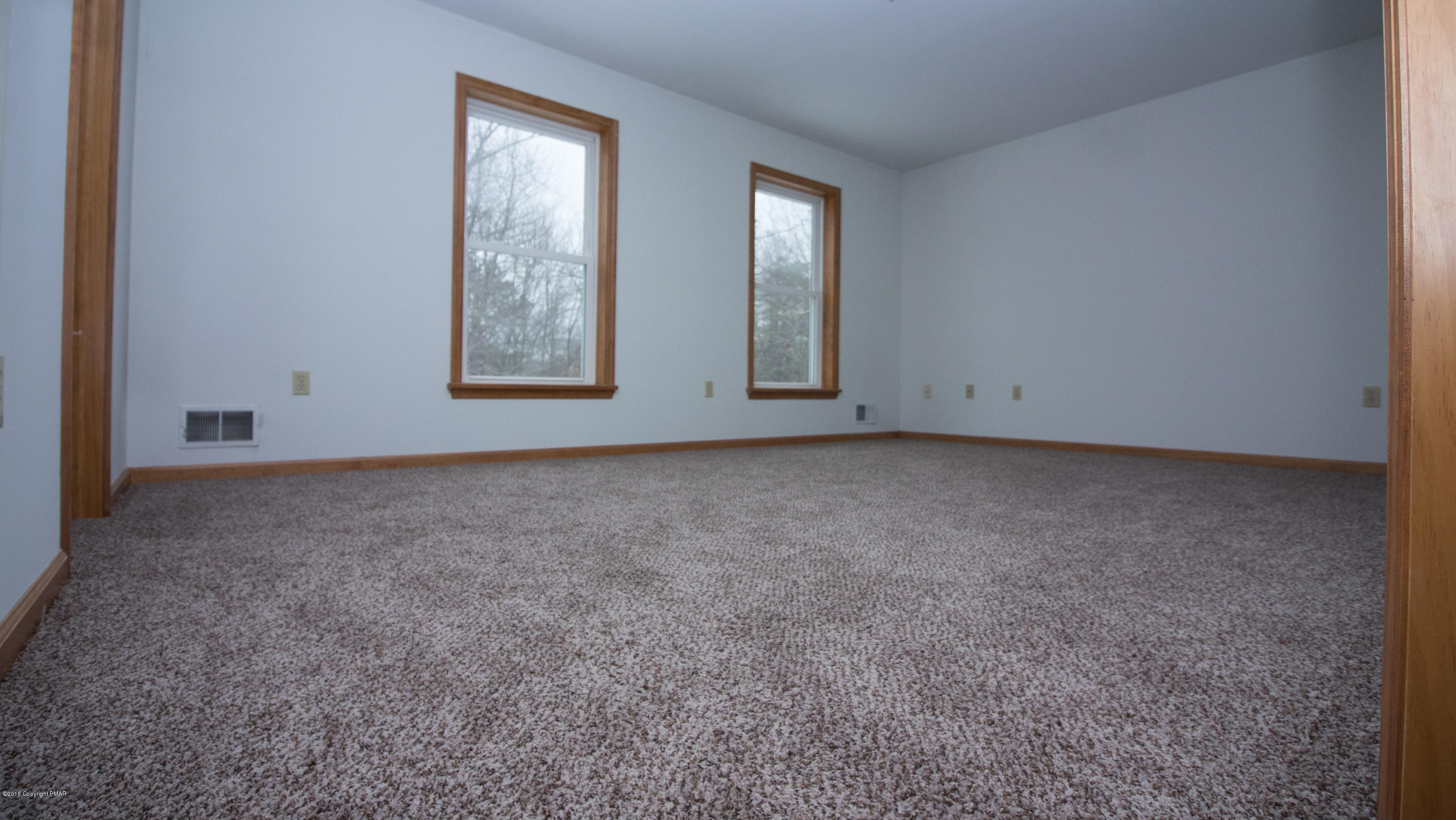 186 Granite Road Long Pond, PA 18334 - Photo 10 of 12 an empty room with windows