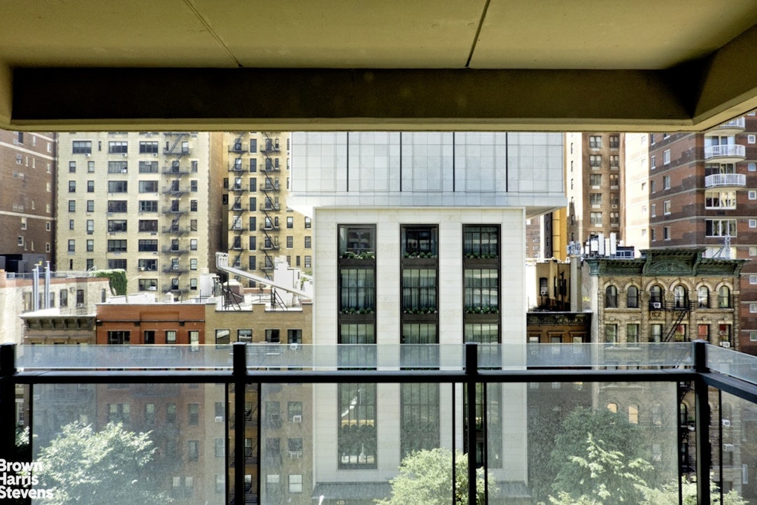 425 East 58th Street, Unit 7D Manhattan, NY 10022 - Photo 2 of 13 a view of a building from a window