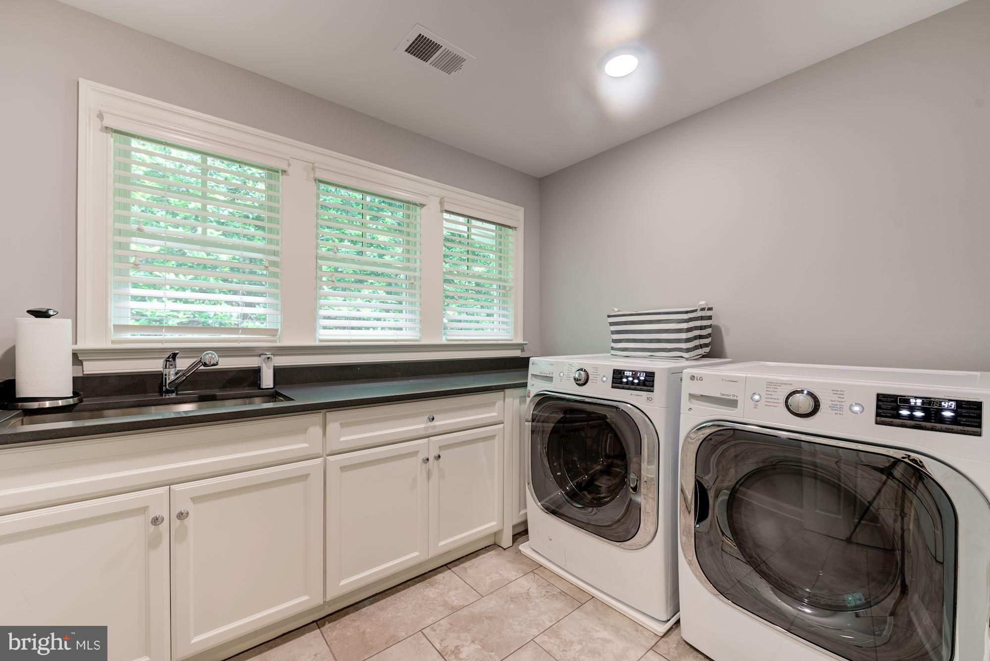 6834 St Albans Road McLean, VA 22101 - Photo 23 of 30 Upper level laundry room w/front loading W/D