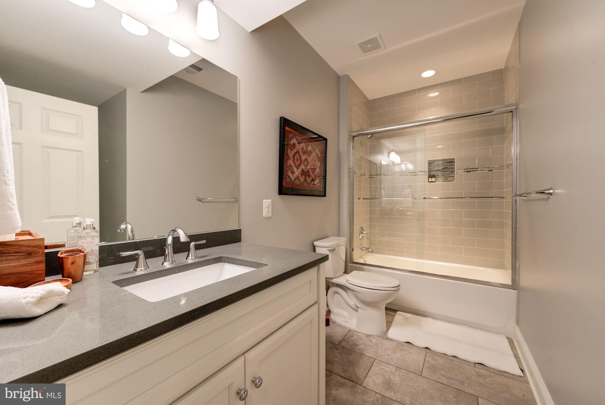 6834 St Albans Road McLean, VA 22101 - Photo 27 of 30 Bath #4 connects to LL bedroom #5