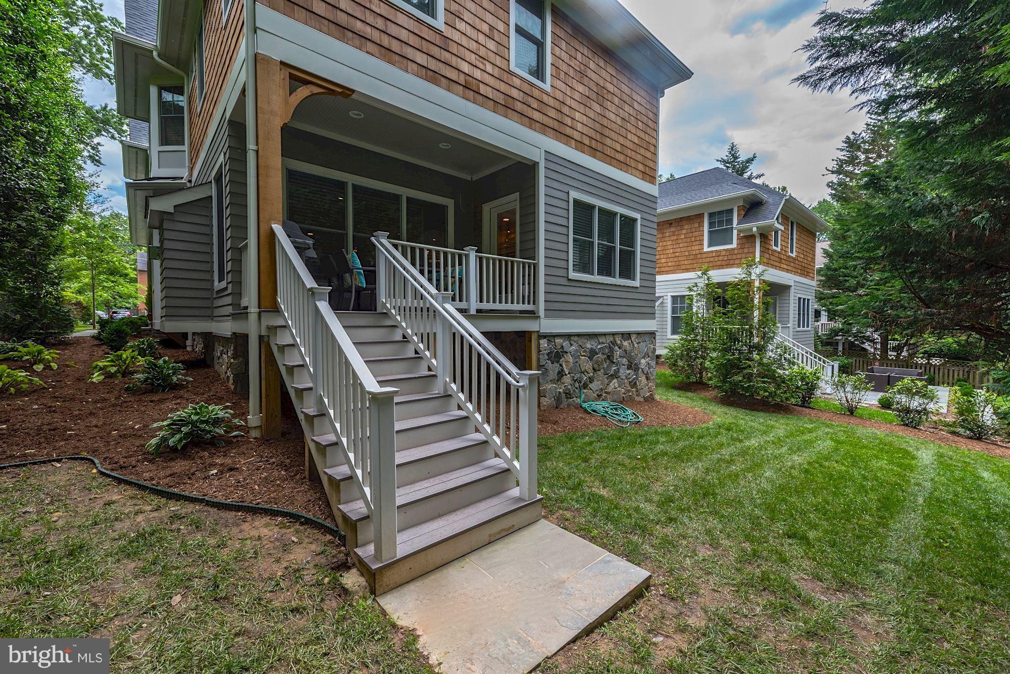 6834 St Albans Road McLean, VA 22101 - Photo 29 of 30 Covered porch and grassy backyard