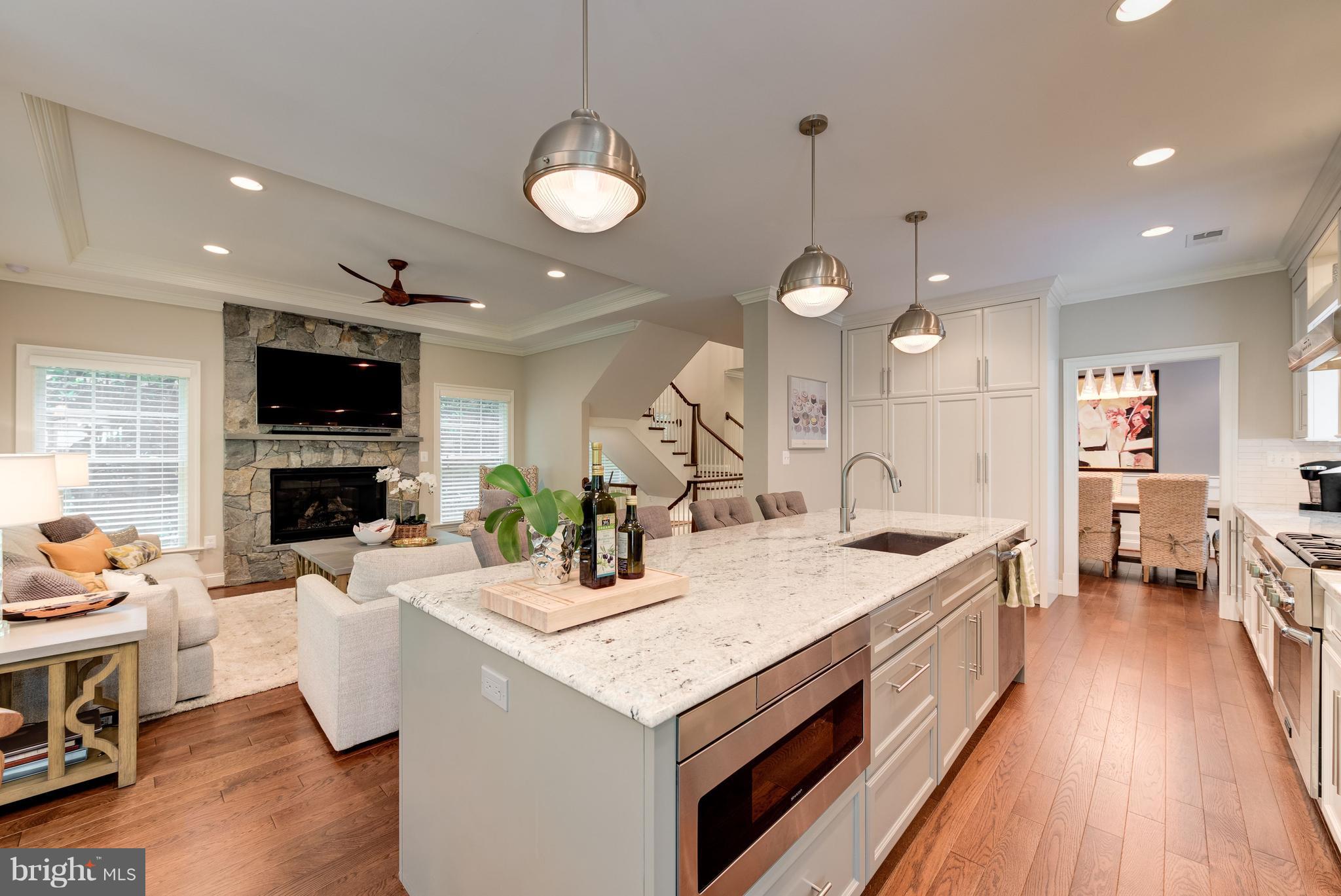6834 St Albans Road McLean, VA 22101 - Photo 6 of 30 Kitchen island seats 4 and opens to Great Room