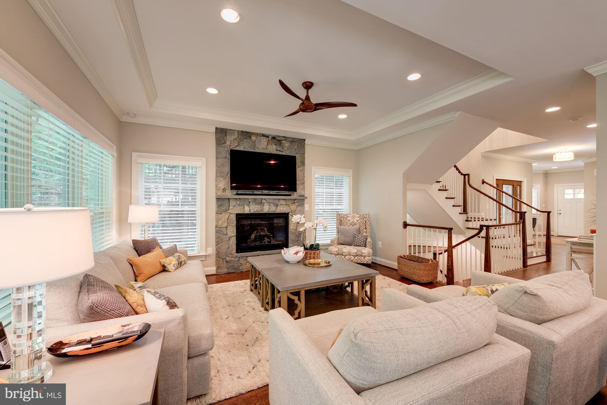 6834 St Albans Road McLean, VA 22101 - Photo 8 of 30 Stone fireplace in light filled Great Room