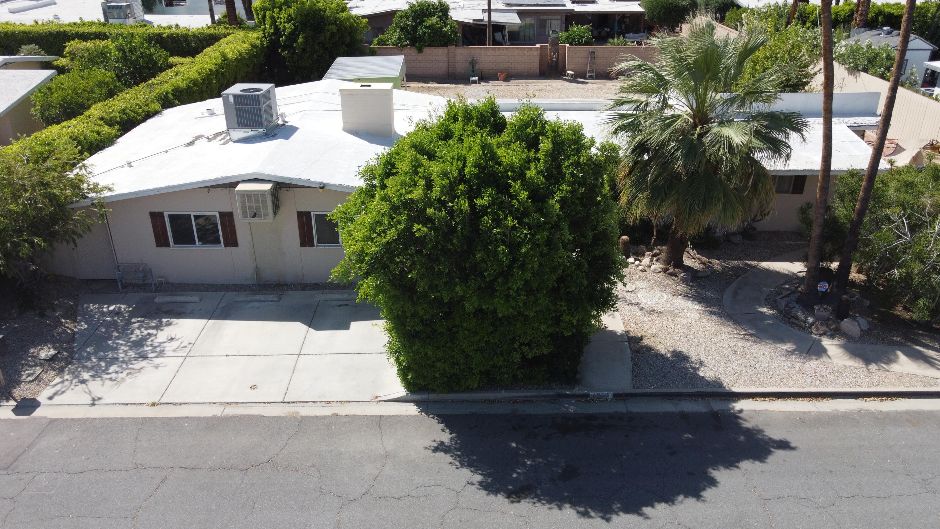 1077 South Riverside Drive Palm Springs, CA 92264 - Photo 7 of 35 a view of a house with a yard