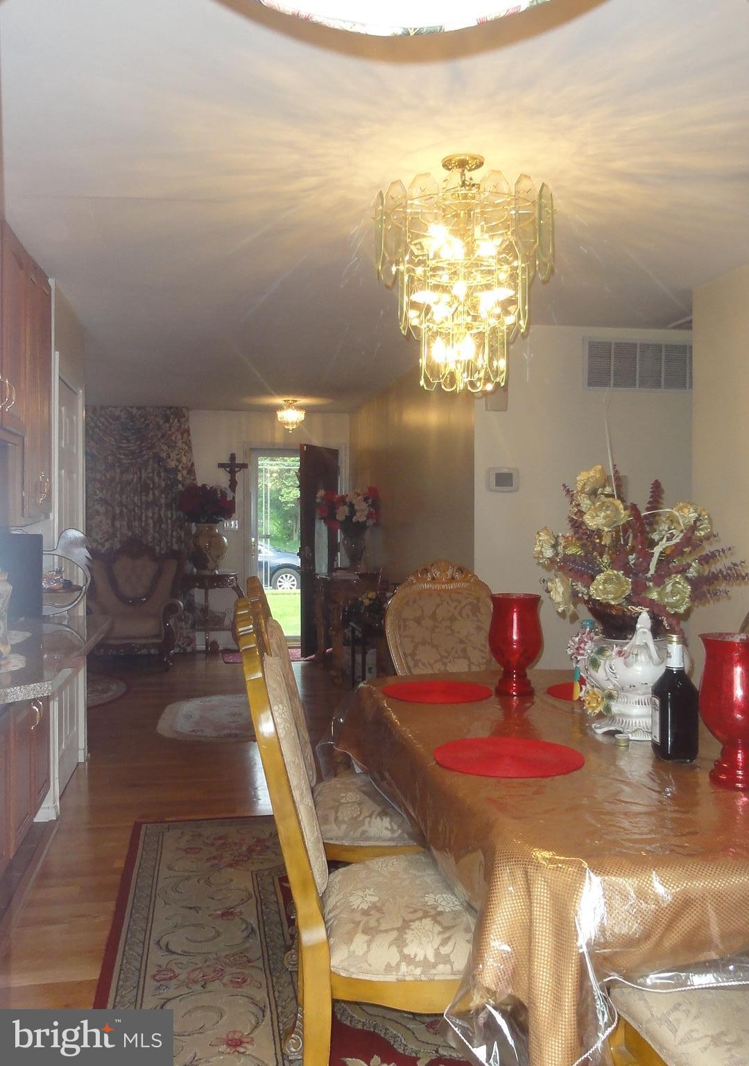 4014 Starbrook Road Randallstown, MD 21133 - Photo 14 of 30 a view of a dining room with furniture