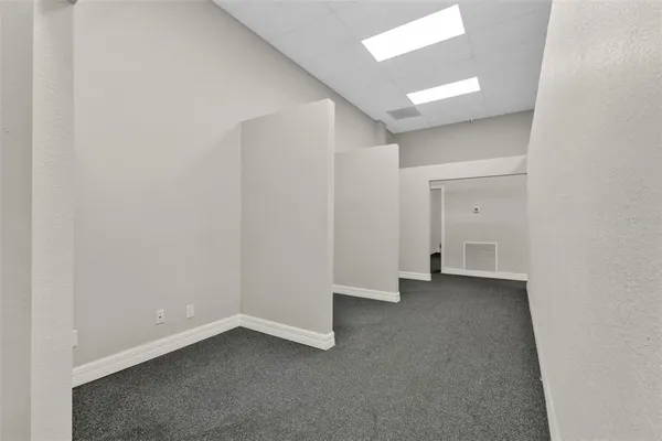 an empty room with a natural light