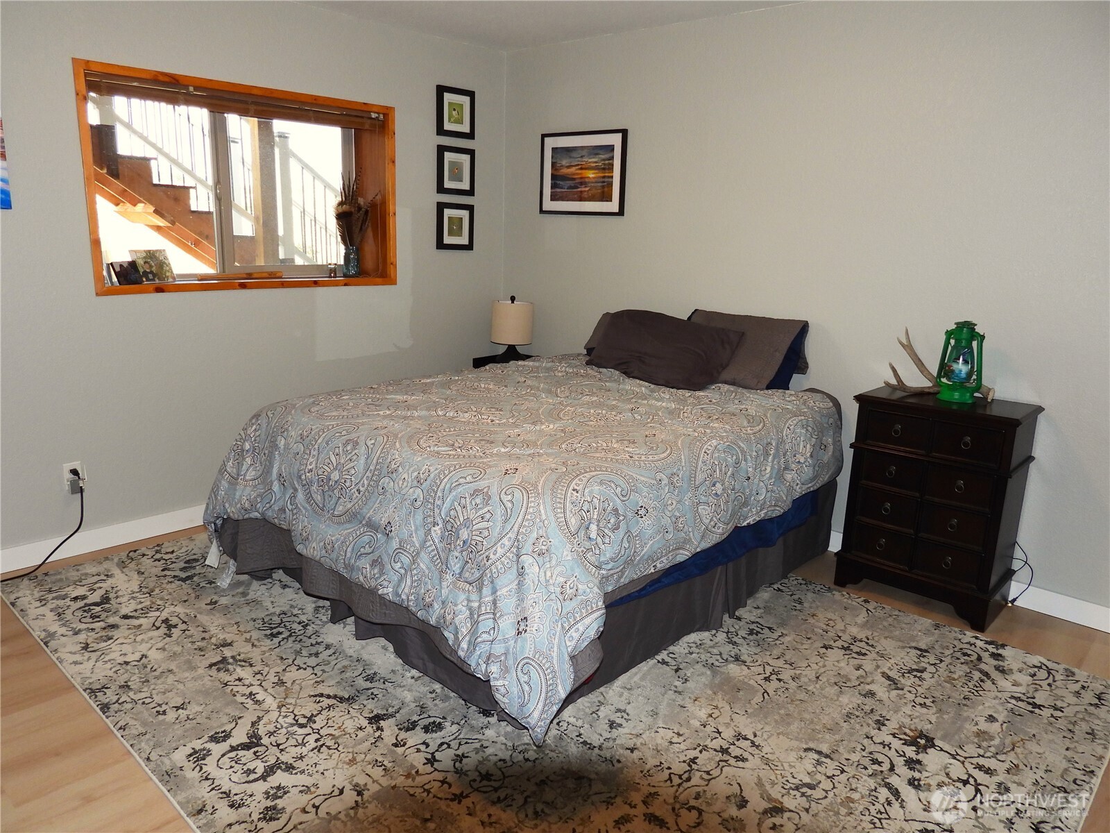 464 State Rte 20 Tonasket, WA 98855 - Photo 14 of 40 a bedroom with a bed and window