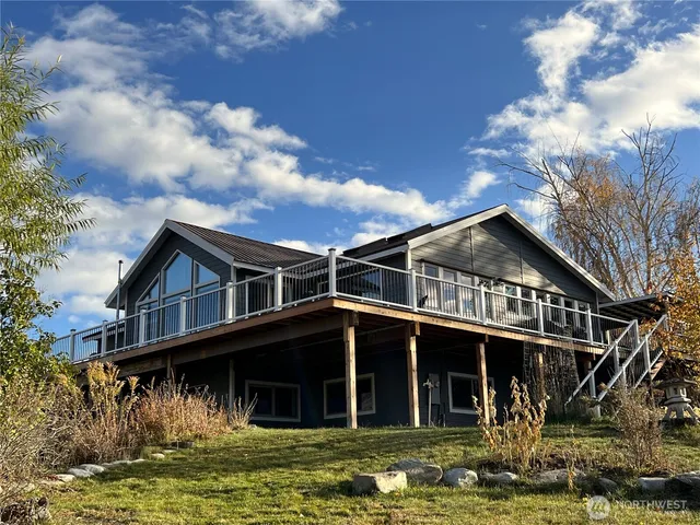 a front view of a house with swimming pool
