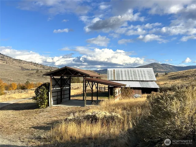 a view of swimming pool with outdoor seating