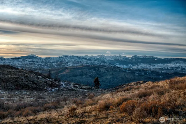 a view of lake and mountain