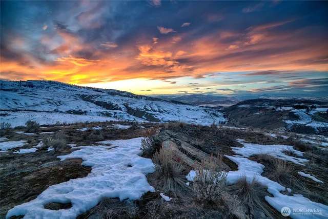 a view of mountains and valleys