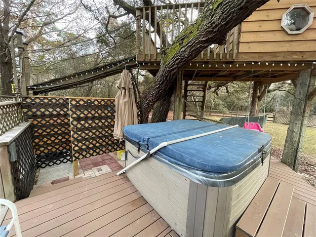 a view of outdoor space with wooden floor