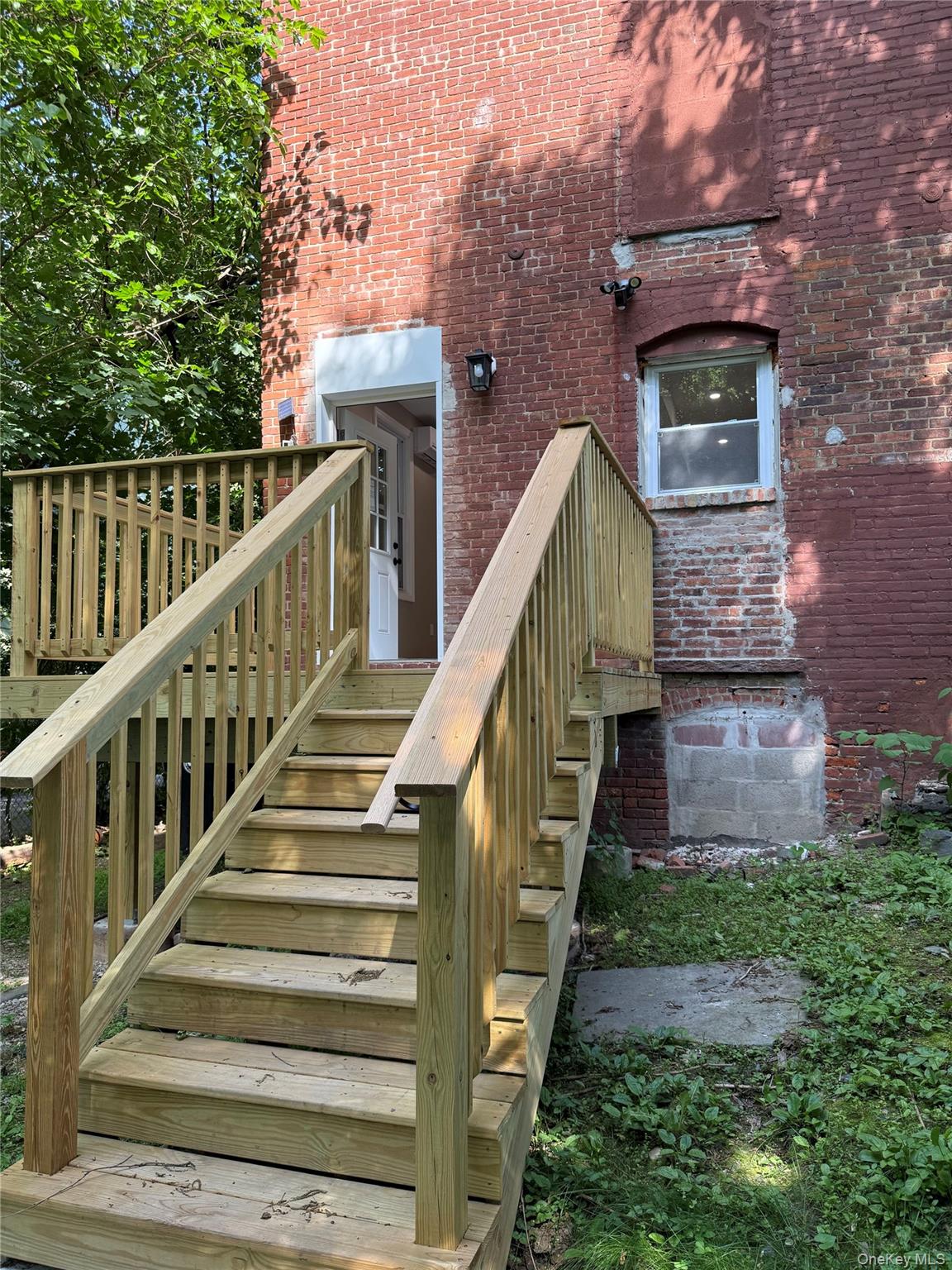 66 Delafield Street, Unit 1 Poughkeepsie, NY 12601 - Photo 16 of 17 Back Porch Stairway