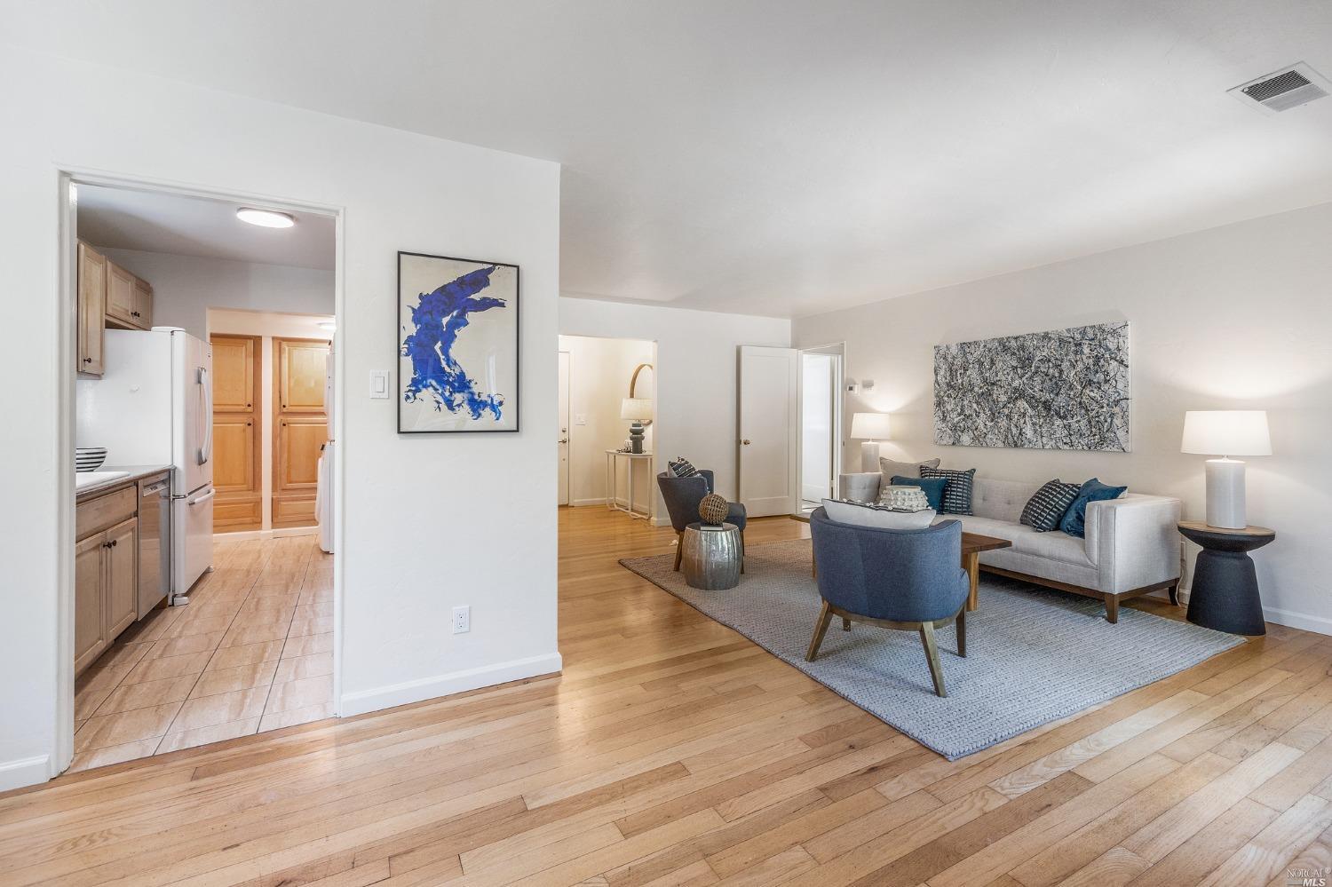 33 Matilda Avenue Mill Valley, CA 94941 - Photo 15 of 31 a living room with furniture and a wooden floor