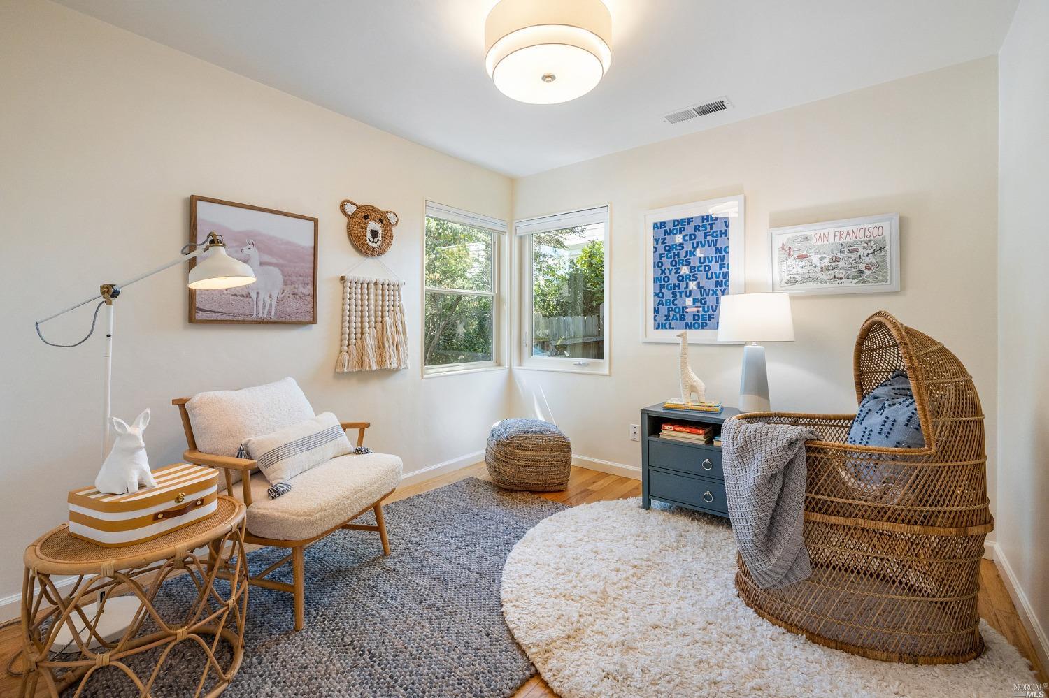 33 Matilda Avenue Mill Valley, CA 94941 - Photo 20 of 31 a living room with furniture and a window