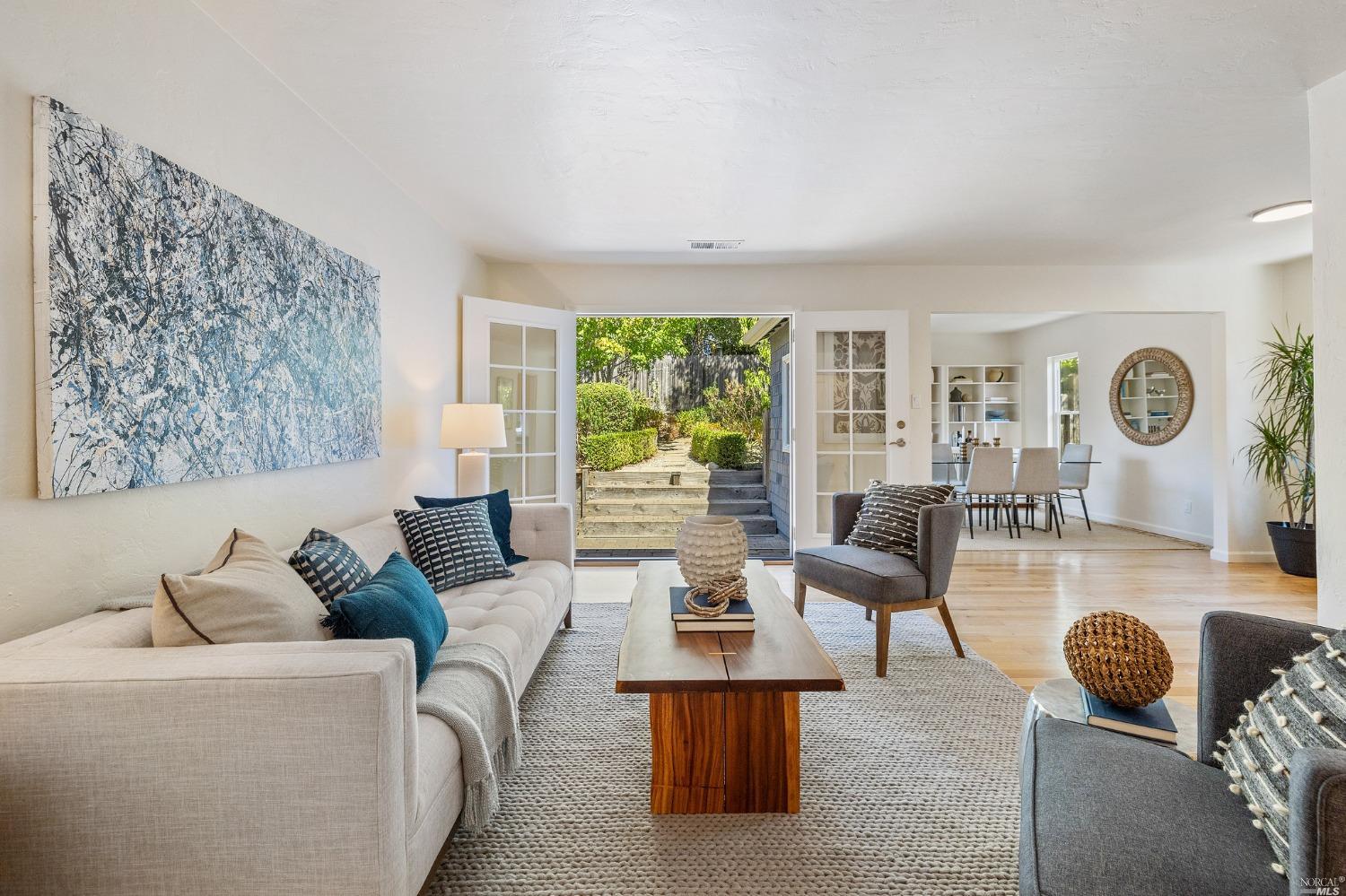 33 Matilda Avenue Mill Valley, CA 94941 - Photo 5 of 31 a living room with furniture and a large window