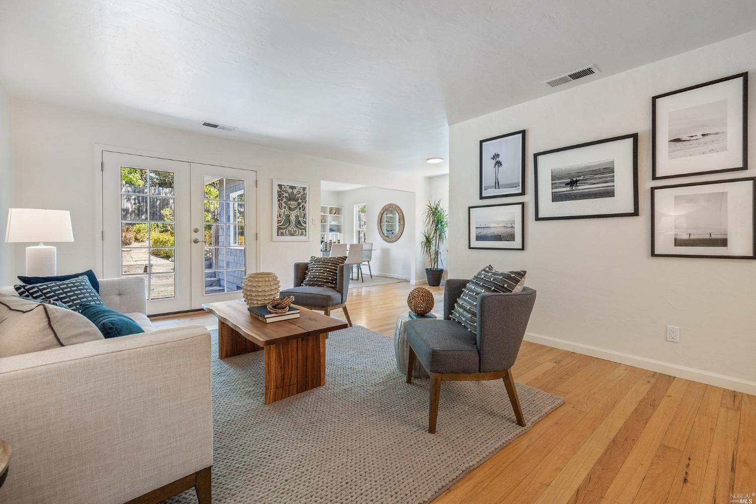 33 Matilda Avenue Mill Valley, CA 94941 - Photo 6 of 31 a living room with furniture and wooden floor