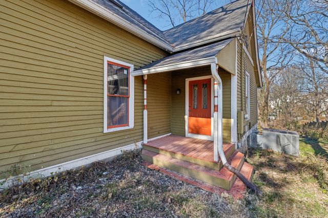 a front view of a house with a porch
