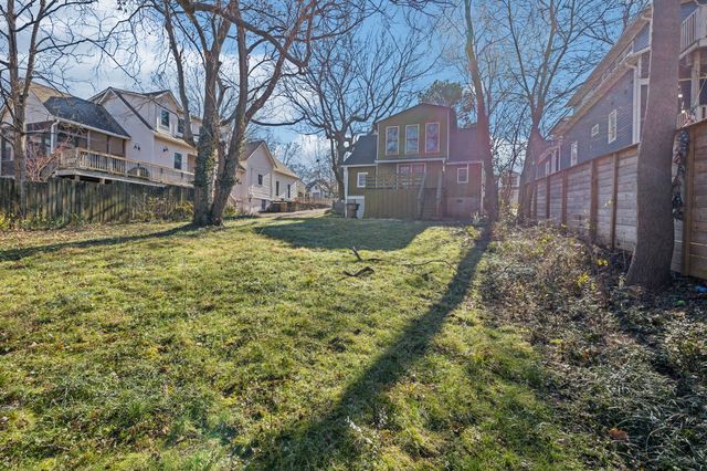 a view of back yard of the house