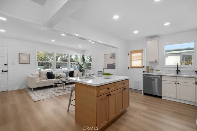 a view of living room with granite countertop furniture and fireplace