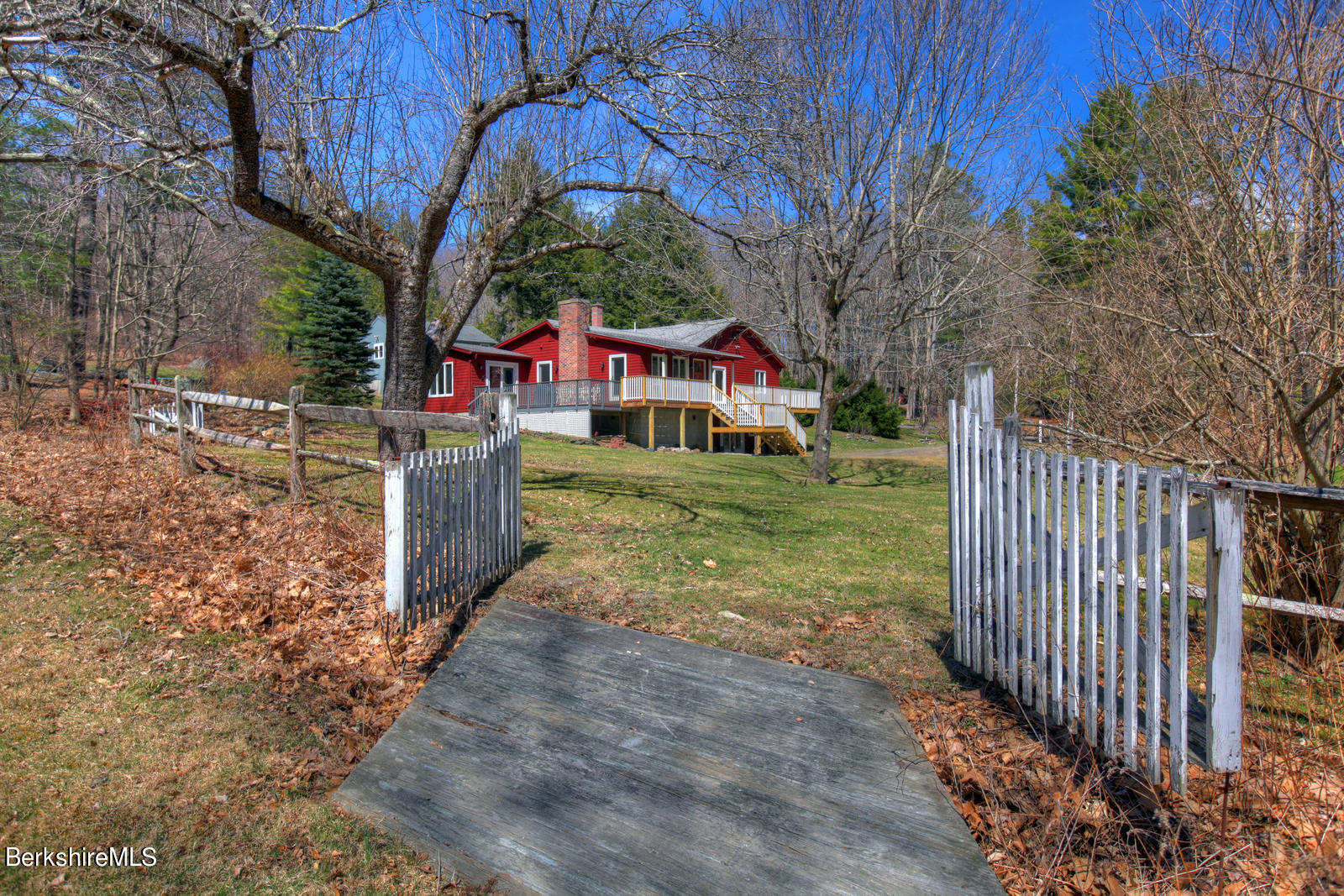 42 Rhoen Road Austerlitz, NY 12017 - Photo 1 of 43 a front view of a house with garden