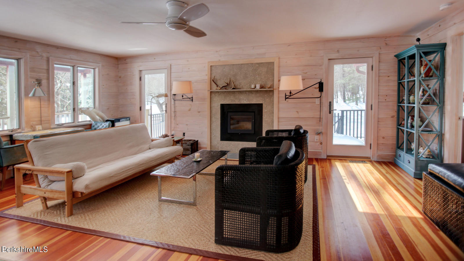 42 Rhoen Road Austerlitz, NY 12017 - Photo 18 of 43 a living room with furniture and a fireplace