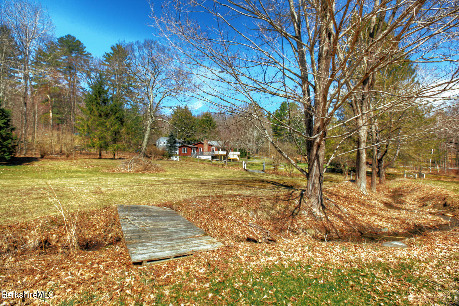 42 Rhoen Road Austerlitz, NY 12017 - Photo 3 of 43 a view of yard with tree in the background