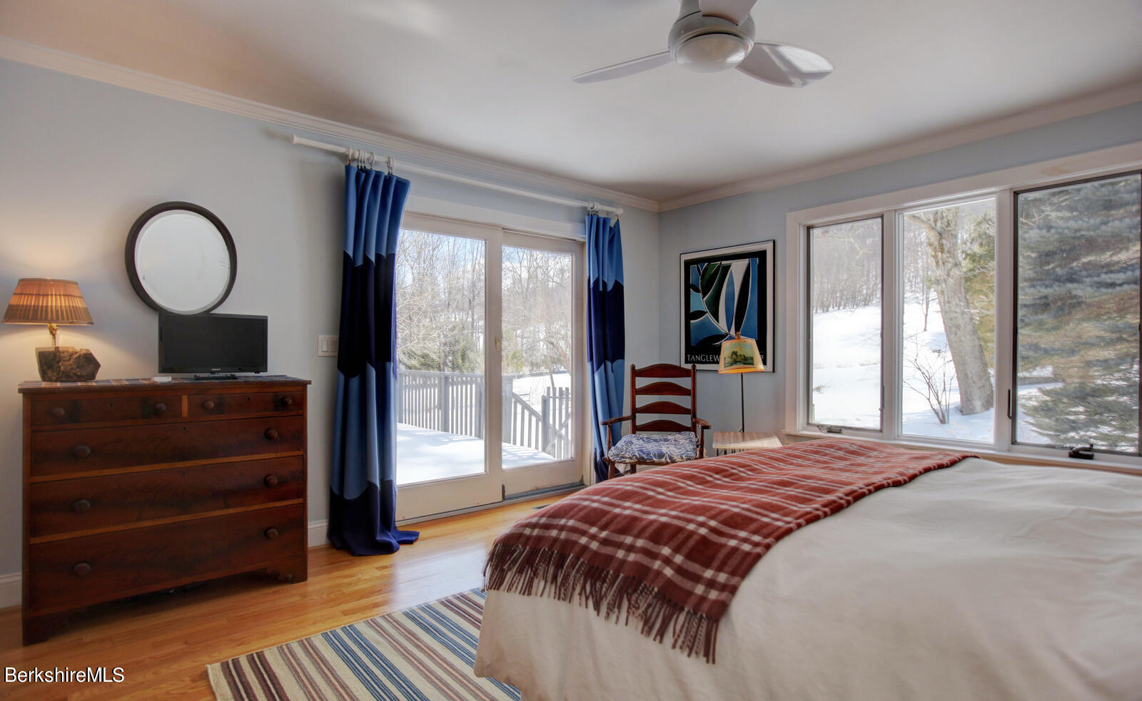 42 Rhoen Road Austerlitz, NY 12017 - Photo 21 of 43 a bedroom with a bed and large windows