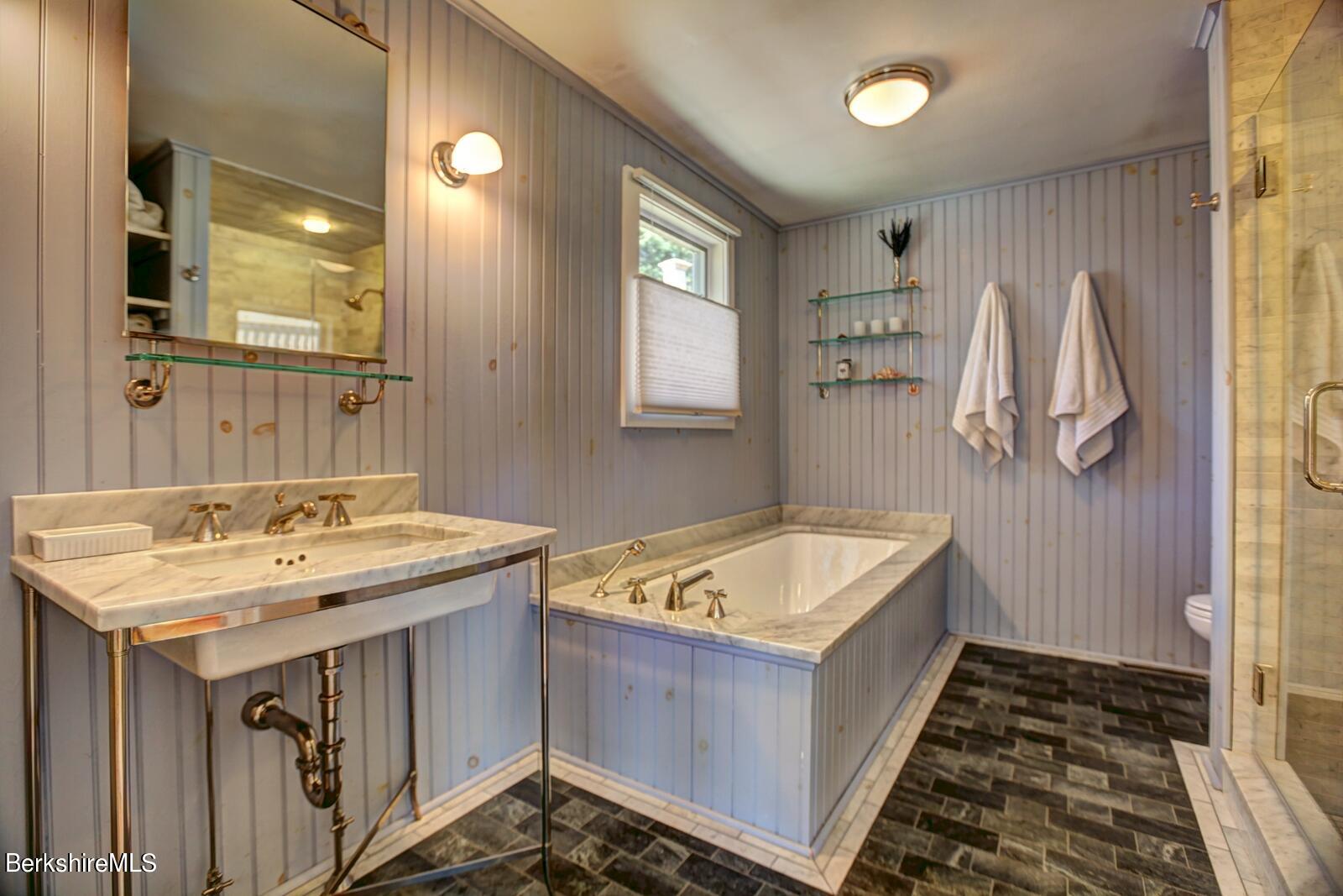 42 Rhoen Road Austerlitz, NY 12017 - Photo 27 of 43 a bathroom with a sink and a mirror