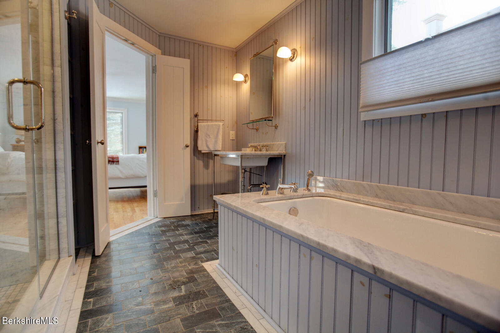 42 Rhoen Road Austerlitz, NY 12017 - Photo 28 of 43 a bathroom with a tub sink and mirror
