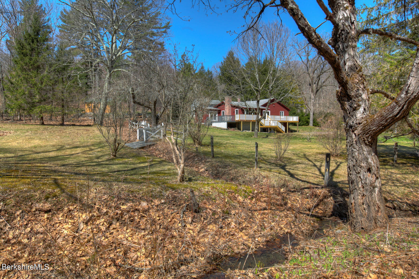 42 Rhoen Road Austerlitz, NY 12017 - Photo 38 of 43 a backyard of a house with table and chairs