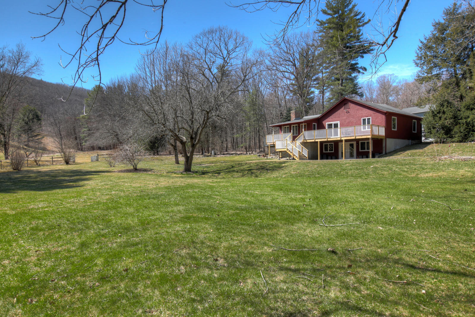 42 Rhoen Road Austerlitz, NY 12017 - Photo 8 of 43 a front view of a house with a yard