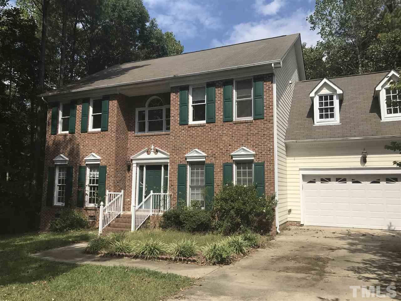 3205 Coppedge Lane Raleigh, NC 27616 - Photo 1 of 20 a front view of a house with a yard