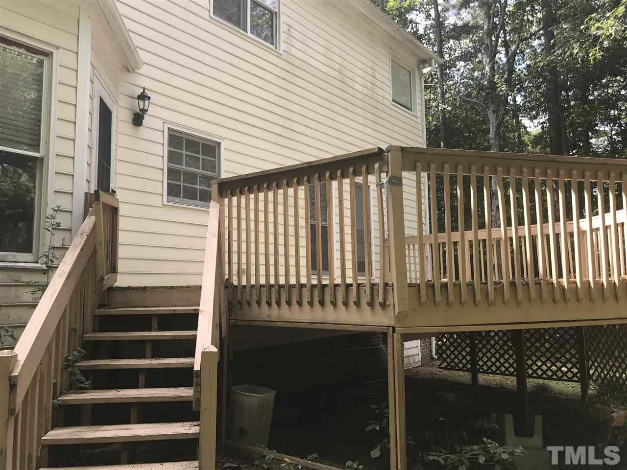 3205 Coppedge Lane Raleigh, NC 27616 - Photo 19 of 20 a front view of a house with a gate