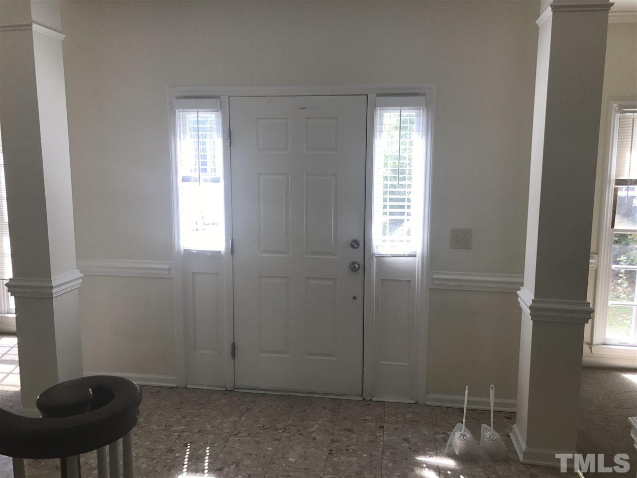 3205 Coppedge Lane Raleigh, NC 27616 - Photo 2 of 20 a view of entryway with window and chandelier