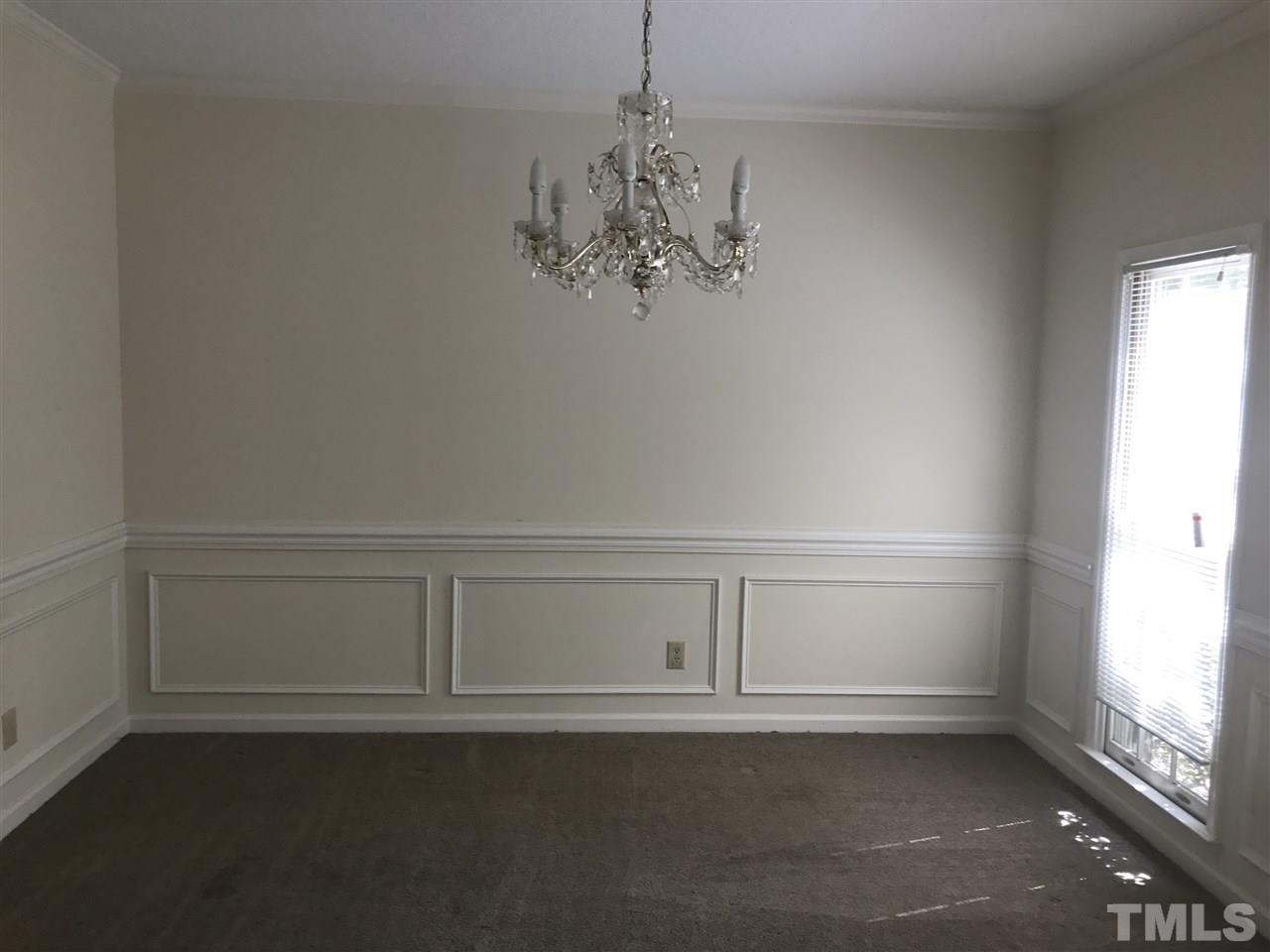 3205 Coppedge Lane Raleigh, NC 27616 - Photo 3 of 20 a view of an empty room with a window