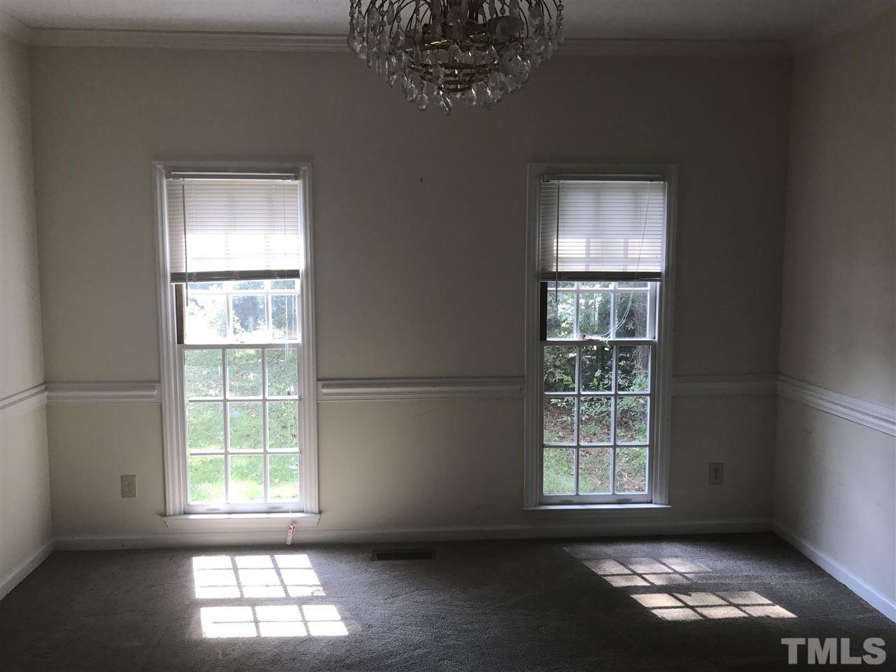 3205 Coppedge Lane Raleigh, NC 27616 - Photo 5 of 20 a view of an empty room with a window