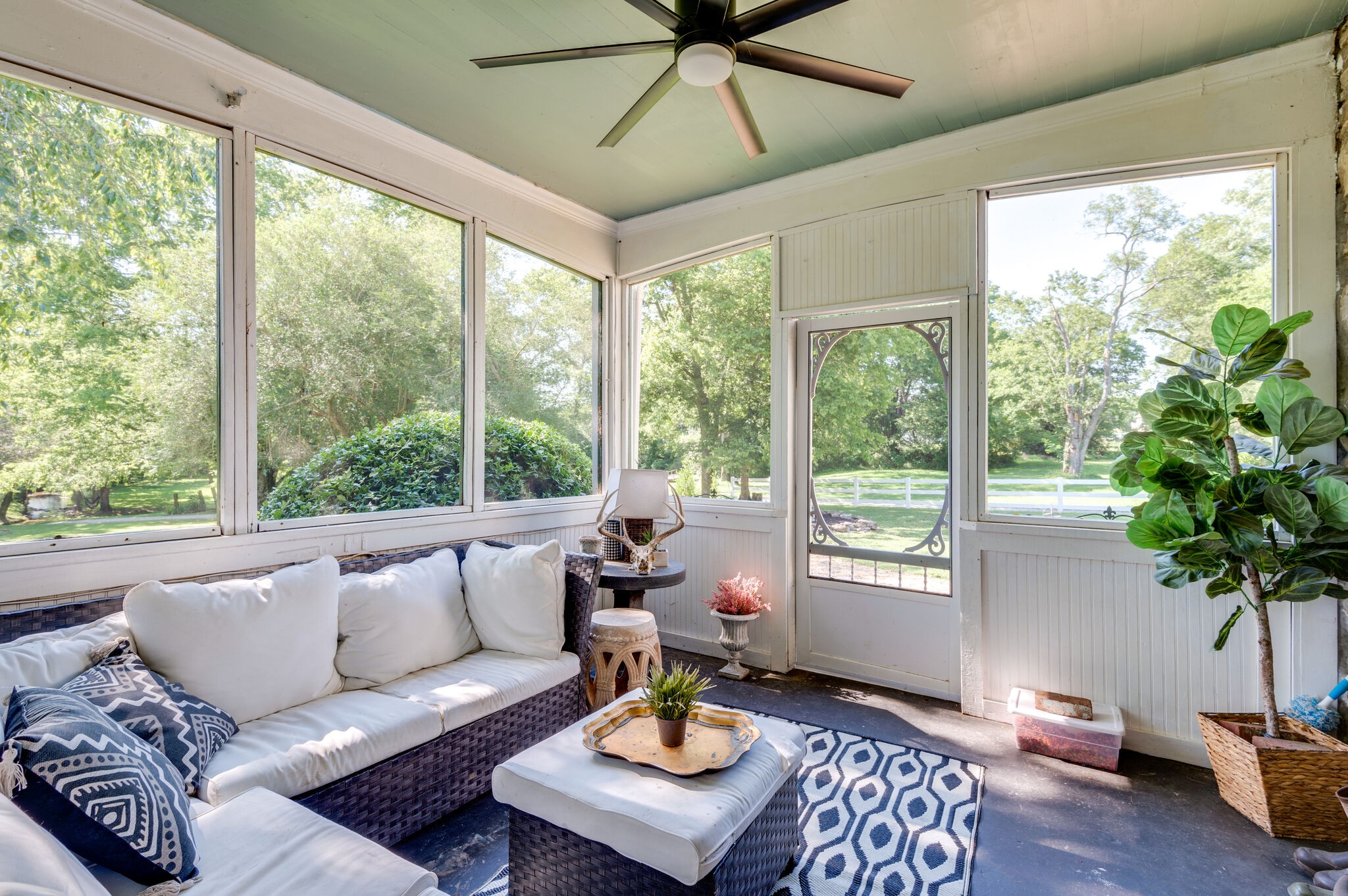 2149 Robertson Road Spring Hill, TN 37174 - Photo 19 of 32 a living room with furniture and a potted plant