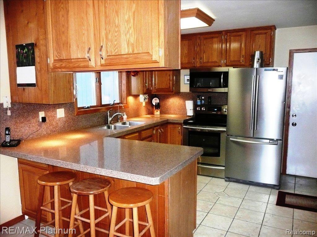 1775 Fox Ridge Drive Howell, MI 48843 - Photo 6 of 11 Updated Kitchen