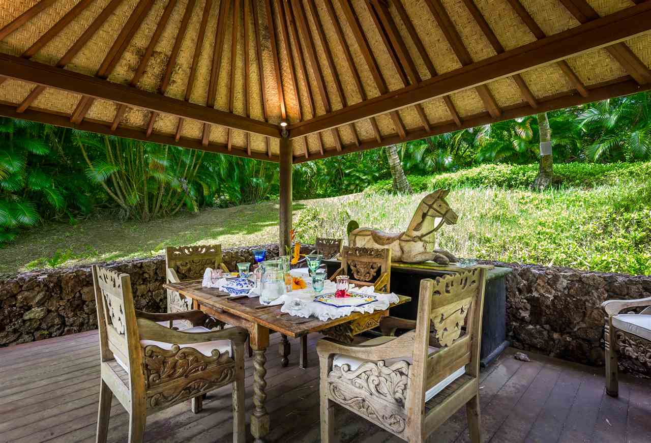 73 Door Of Faith Road Haiku, HI 96708 - Photo 2 of 30 a view of an outdoor dining space with furniture and backyard