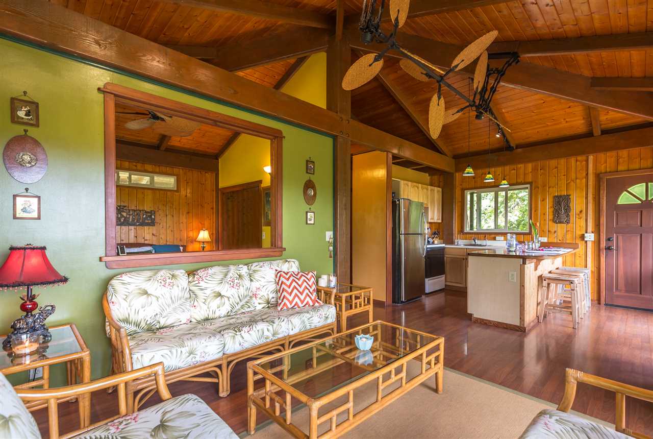 73 Door Of Faith Road Haiku, HI 96708 - Photo 9 of 30 a living room with furniture and wooden floor