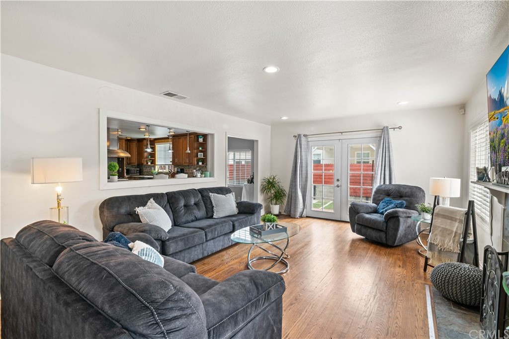4909 El Molino Avenue Riverside, CA 92504 - Photo 3 of 33 a living room with furniture and a large window